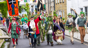 A colourful pageant, known as Hal an Tow, featuring people dressed as characters from the song 